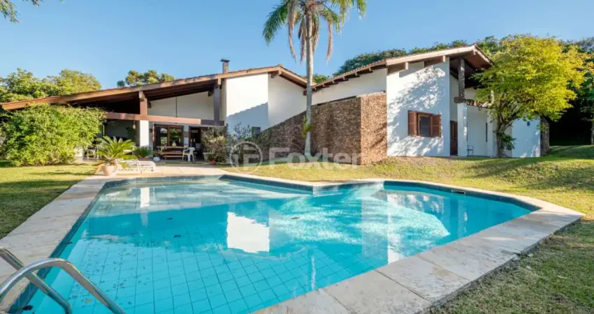 Casa em condomínio fechado com 3 quartos à venda na Avenida da Cavalhada, 5205, Cavalhada, Porto Alegre