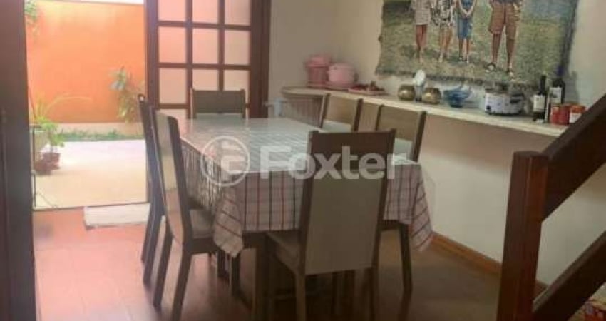 Casa em condomínio fechado com 3 quartos à venda na Avenida Coronel Marcos, 1608, Pedra Redonda, Porto Alegre