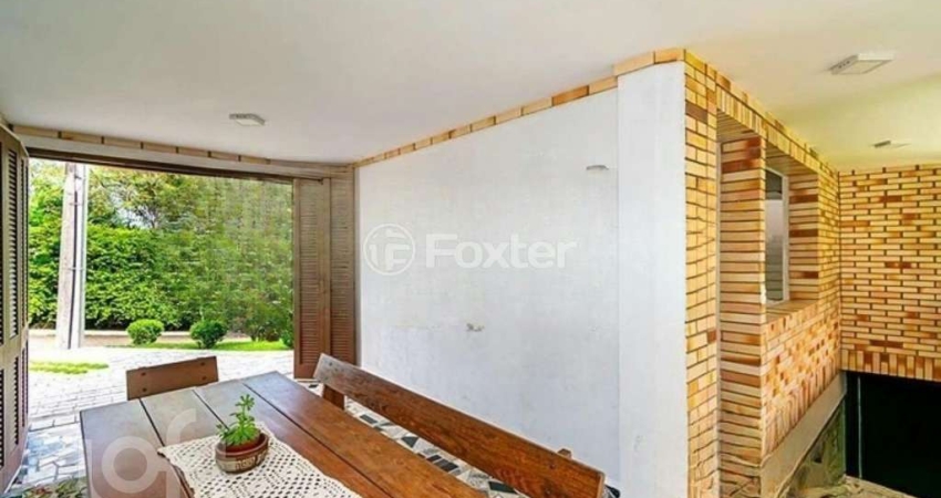 Casa em condomínio fechado com 3 quartos à venda na Rua Alcebíades Antônio dos Santos, 605, Nonoai, Porto Alegre