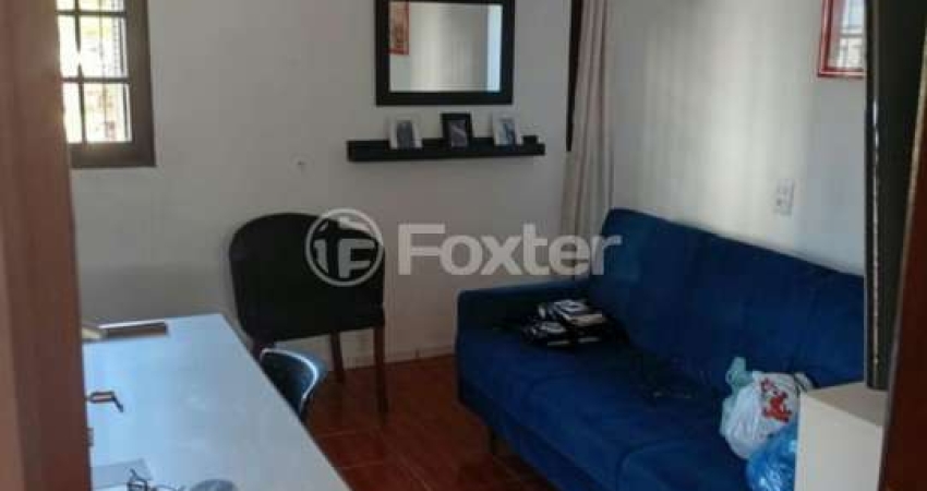 Casa com 5 quartos à venda na Rua Butuí, 38, Cristal, Porto Alegre