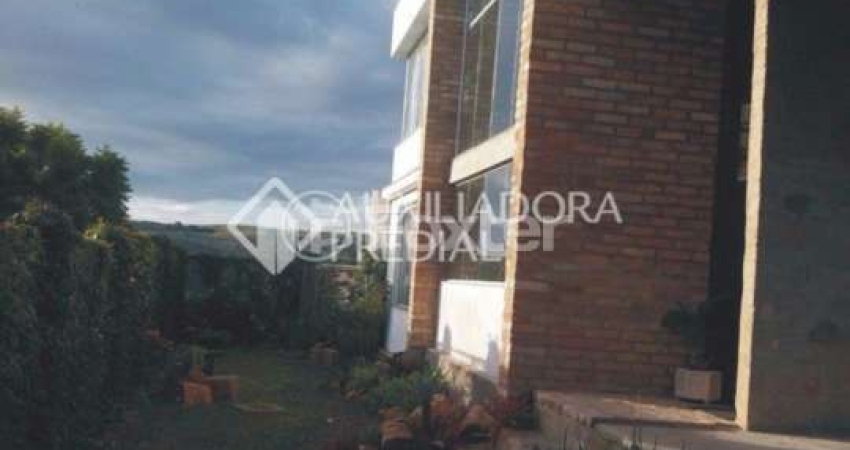 Casa com 3 quartos à venda na Rua Amapá, 1600, Vila Nova, Porto Alegre