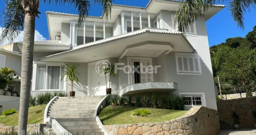 Casa em condomínio fechado com 4 quartos à venda na Estrada Haroldo Soares Glavan, 3450, Cacupé, Florianópolis