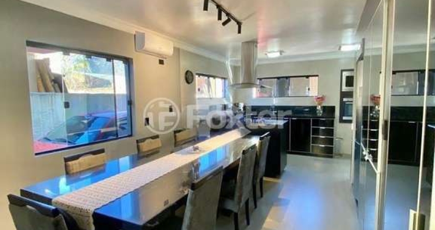 Casa com 4 quartos à venda na Rua Corrêa de Mello, 1060, Sarandi, Porto Alegre
