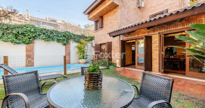 Casa com 4 quartos à venda na Avenida Luiz Manoel Gonzaga, 803, Três Figueiras, Porto Alegre