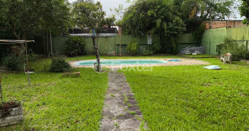 Casa com 3 quartos à venda na Rua Jataí, 820, Cristal, Porto Alegre