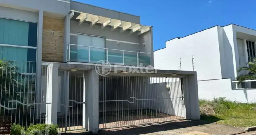 Casa com 3 quartos à venda na Rua das Gérberas, 445, Parque da Matriz, Gravataí