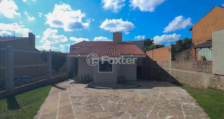 Casa com 3 quartos à venda na Rua Amapá, 932, Vila Nova, Porto Alegre
