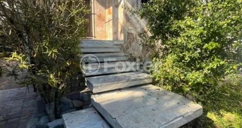 Casa com 2 quartos à venda na Rua Itapema, 107, Vila Jardim, Porto Alegre