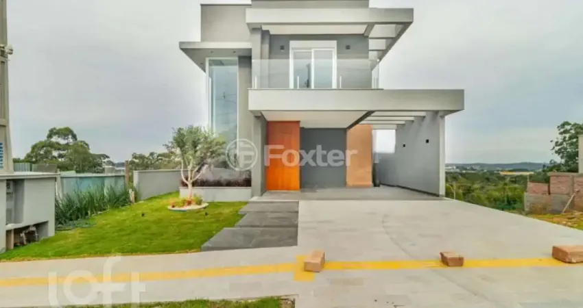 Casa em condomínio fechado com 3 quartos à venda na Rua Adolfo Inácio de Barcelos, 1490, Centro, Gravataí