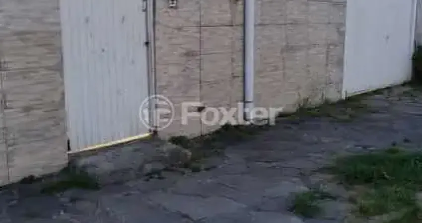 Casa com 3 quartos à venda na Acesso F, 2488, Restinga, Porto Alegre