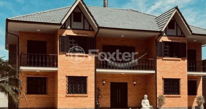 Casa em condomínio fechado com 3 quartos à venda na Avenida Afonso Delambert Neto, 50, Lagoa da Conceição, Florianópolis