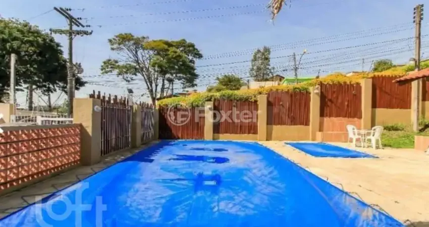 Casa em condomínio fechado com 3 quartos à venda na Rua Humberto de Campos, 601, Partenon, Porto Alegre