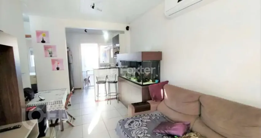 Casa em condomínio fechado com 2 quartos à venda na Estrada Costa Gama, 5124, Restinga, Porto Alegre
