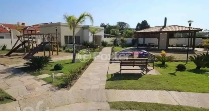 Casa em condomínio fechado com 2 quartos à venda na Estrada Costa Gama, 5124, Restinga, Porto Alegre