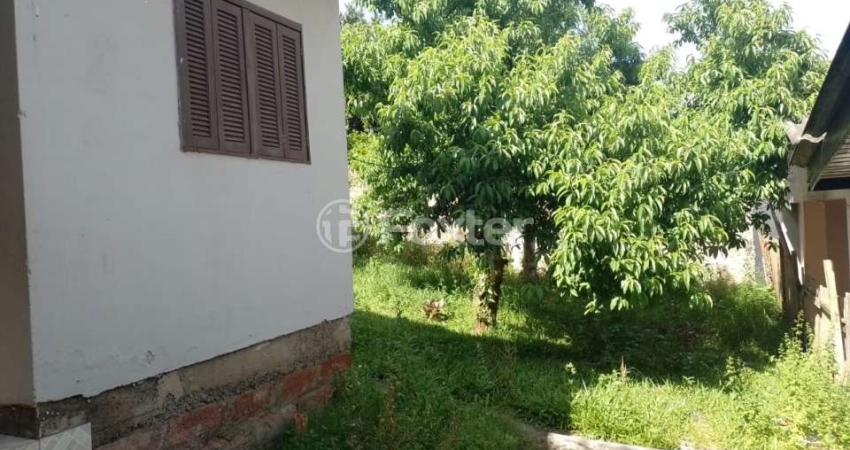 Casa com 3 quartos à venda na Rua Guaianá, 549, Vila Monte Carlo, Cachoeirinha