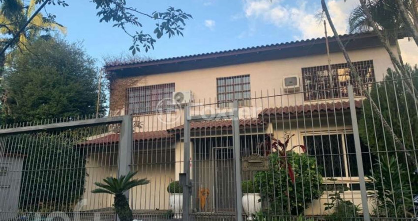 Casa com 4 quartos à venda na Rua Matias José Bins, 290, Três Figueiras, Porto Alegre