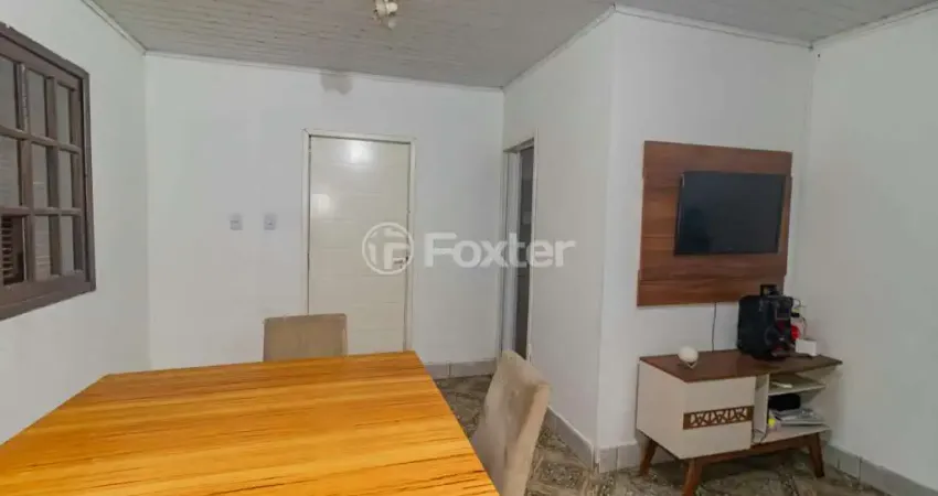 Casa com 3 quartos à venda na Rua Frederico Mentz, 92, Navegantes, Porto Alegre