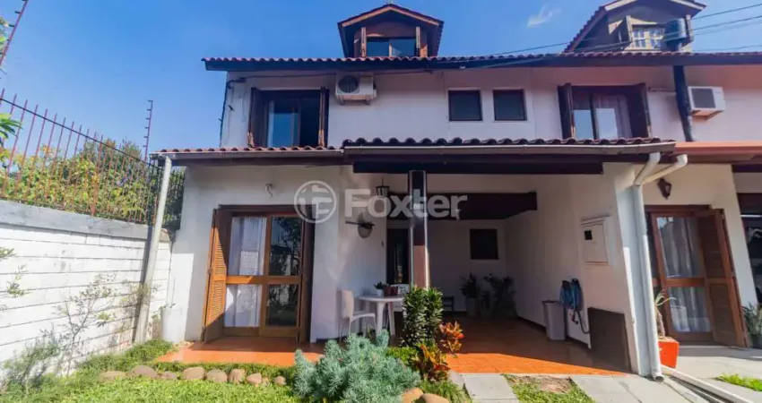 Casa em condomínio fechado com 3 quartos à venda na Avenida Eduardo Prado, 695, Vila Nova, Porto Alegre