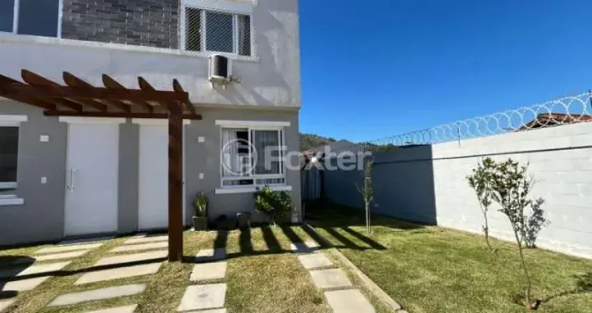 Casa em condomínio fechado com 2 quartos à venda na Estrada Cristiano Kraemer, 5018, Vila Nova, Porto Alegre