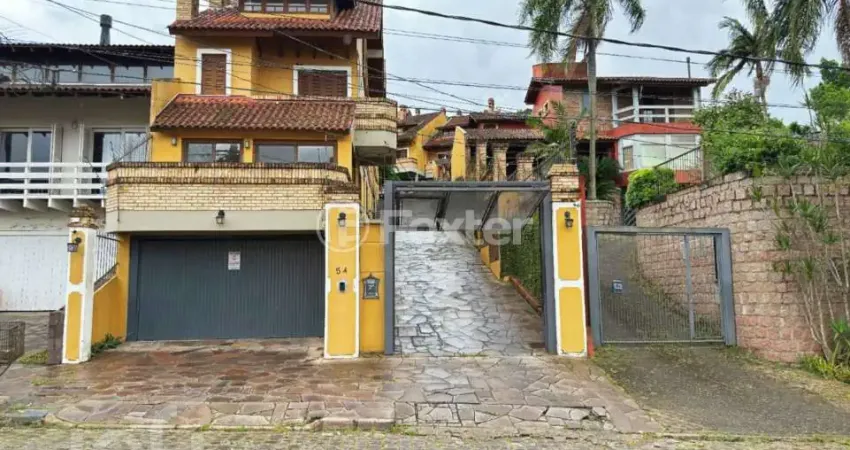 Casa em condomínio fechado com 3 quartos à venda na Rua Edgar Luiz Schneider, 54, Jardim Isabel, Porto Alegre