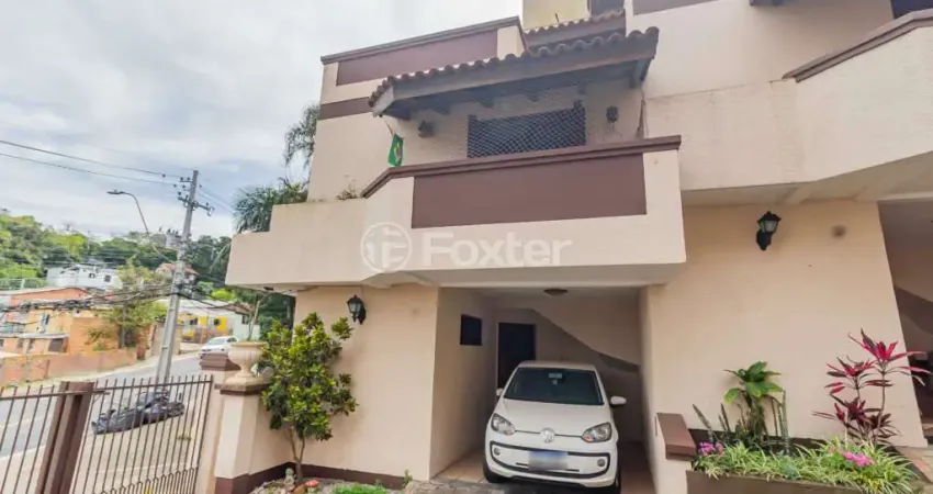 Casa em condomínio fechado com 3 quartos à venda na Avenida Wenceslau Escobar, 3714, Vila Conceição, Porto Alegre