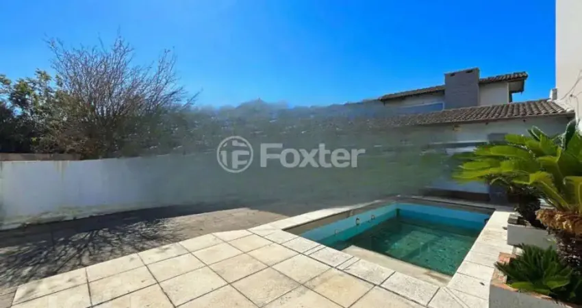 Casa com 3 quartos à venda na Avenida Guaíba, 13156, Guarujá, Porto Alegre