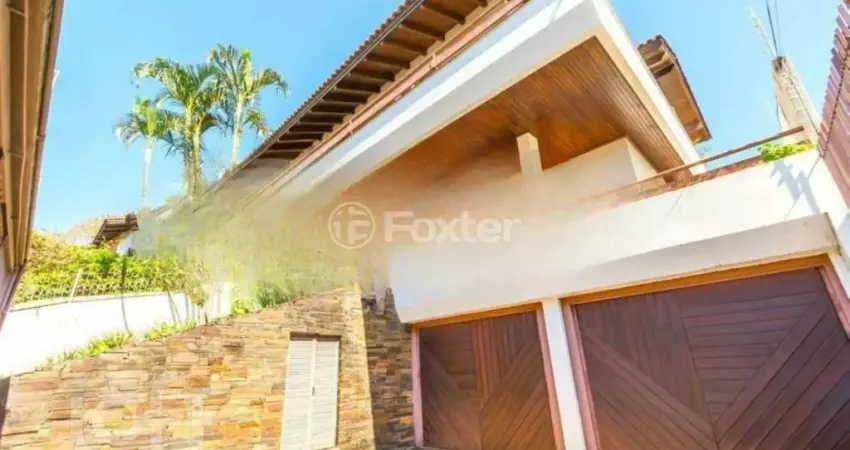 Casa com 4 quartos à venda na Rua Matias José Bins, 777, Três Figueiras, Porto Alegre