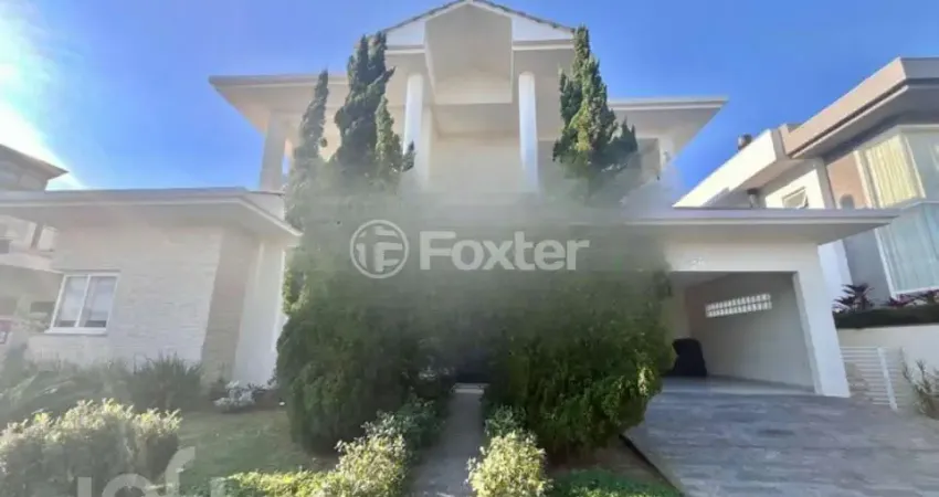 Casa em condomínio fechado com 4 quartos à venda na Rodovia Doutor Antônio Luiz Moura Gonzaga, 3825, Rio Tavares, Florianópolis