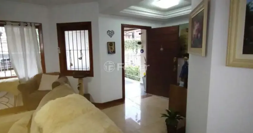 Casa à venda na Rua Alcebíades Antônio dos Santos, 614, Nonoai, Porto Alegre
