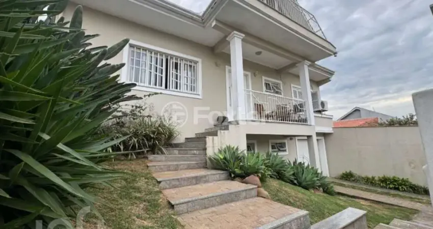 Casa com 3 quartos à venda na Rua das Petúnias, 72, Estância Velha, Canoas