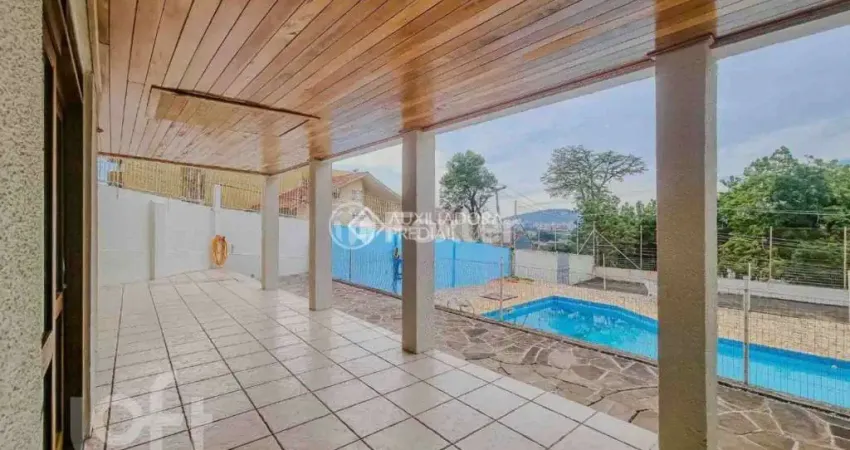 Casa em condomínio fechado com 3 quartos à venda na Rua Martim Afonso, 115, Santo Antônio, Porto Alegre