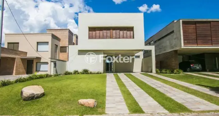 Casa em condomínio fechado com 3 quartos à venda na Avenida Juca Batista, 9000, Belém Novo, Porto Alegre