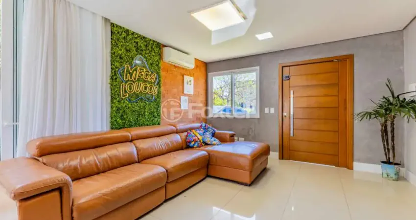 Casa em condomínio fechado com 3 quartos à venda na Rua Major Aviador Falcão, 46, Hípica, Porto Alegre