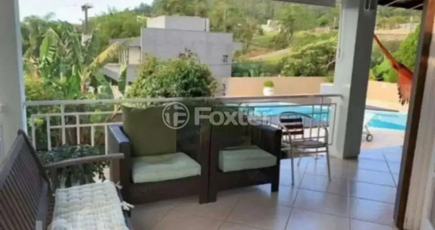 Casa com 3 quartos à venda na Estrada Haroldo Soares Glavan, 3820, Cacupé, Florianópolis