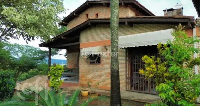 Casa com 4 quartos à venda na Rua Pedro de Oliveira França, 80, Hípica, Porto Alegre
