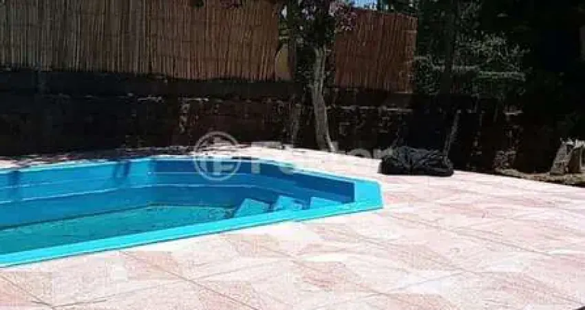 Casa com 4 quartos à venda na Rua Pedro de Oliveira França, 80, Hípica, Porto Alegre