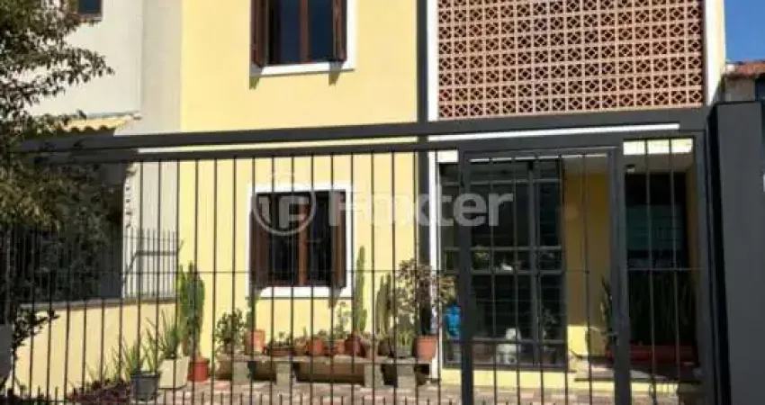 Casa com 3 quartos à venda na Rua Eva Pinto, 114, Hípica, Porto Alegre