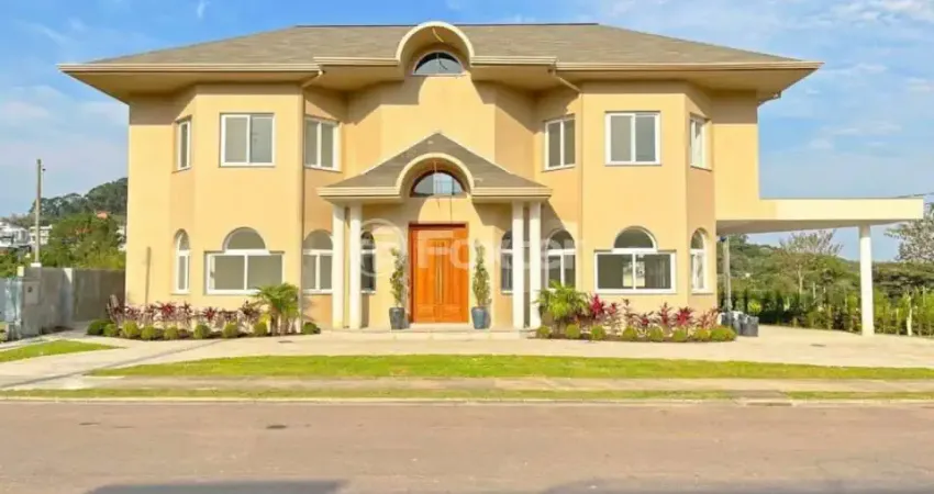 Casa em condomínio fechado com 3 quartos à venda na Estrada das Três Meninas, 2000, Vila Nova, Porto Alegre