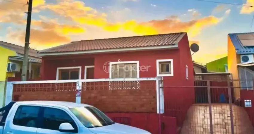 Casa com 3 quartos à venda na Rua Biguás, 847, Jardim Algarve, Alvorada