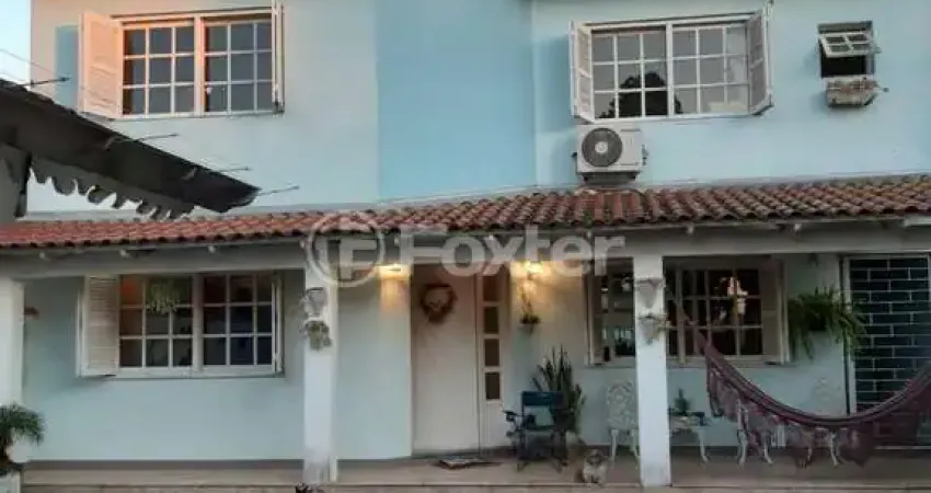 Casa com 4 quartos à venda na Avenida José Corrêa da Silva, 547, Cavalhada, Porto Alegre