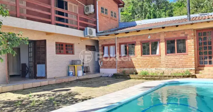 Casa com 3 quartos à venda na Rua A, 263, Vila Nova, Porto Alegre