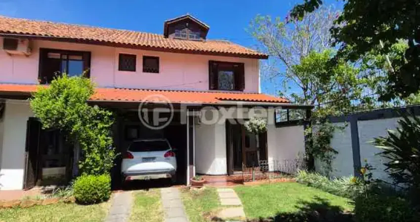 Casa em condomínio fechado com 3 quartos à venda na Avenida Eduardo Prado, 695, Cavalhada, Porto Alegre