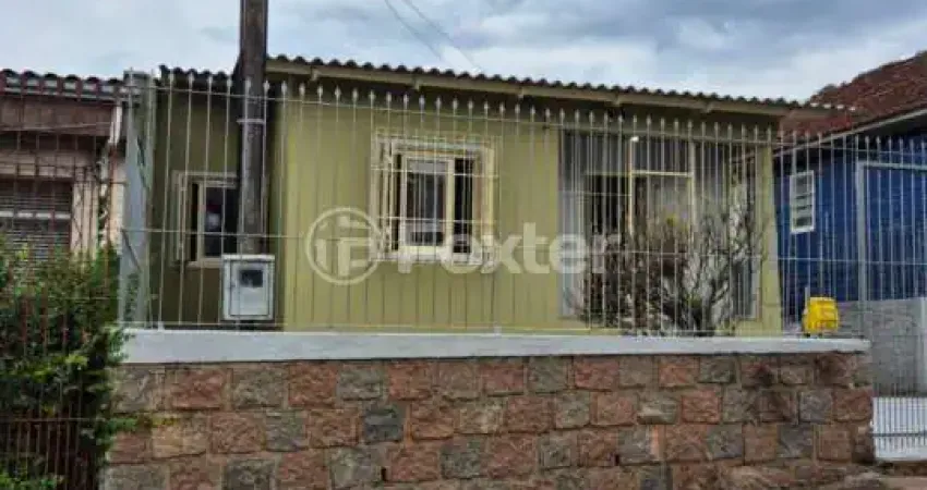 Casa com 4 quartos à venda na Rua Doze de Outubro, 232, Partenon, Porto Alegre