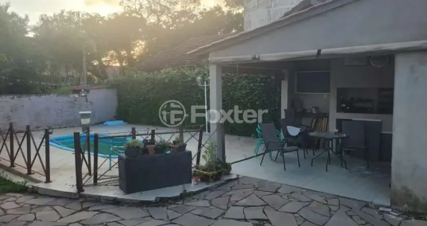 Casa com 3 quartos à venda na Rua Menezes Paredes, 225, Nonoai, Porto Alegre