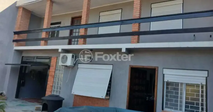 Casa com 4 quartos à venda na Rua Doutor Carlos Niederauer Hofmeister, 993, Restinga, Porto Alegre