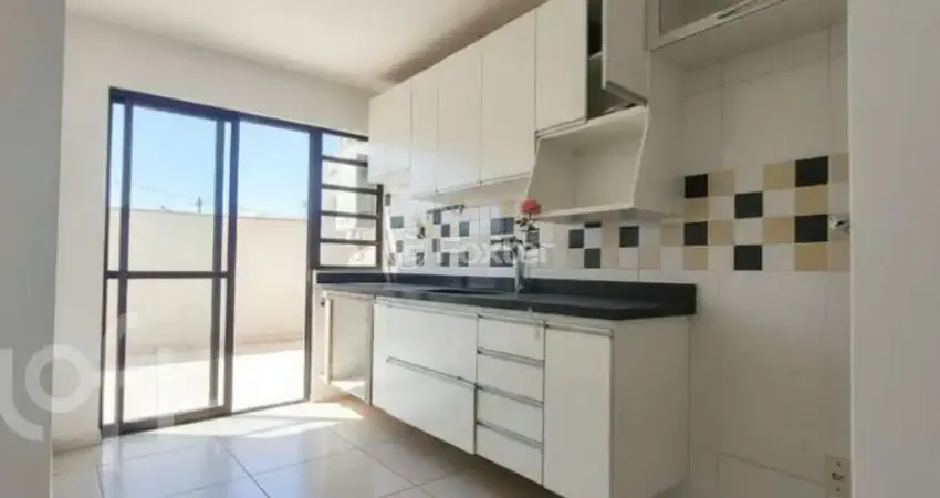 Casa com 3 quartos à venda na Rua Heitor Kramer, 65, Guarujá, Porto Alegre