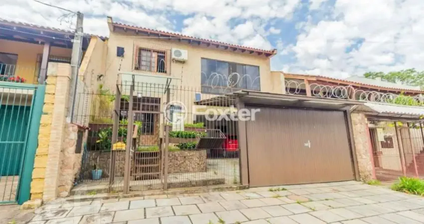 Casa com 3 quartos à venda na Rua Lloyd de Andrade Polidoro, 55, Ipanema, Porto Alegre