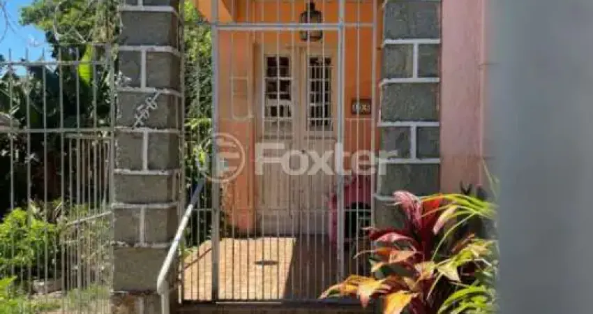 Casa com 4 quartos à venda na Rua Humberto de Campos, 156, Partenon, Porto Alegre