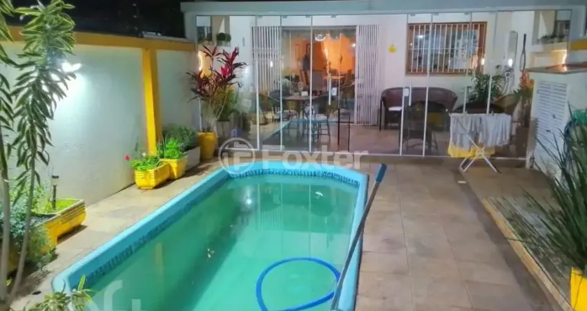 Casa com 3 quartos à venda na Avenida Copacabana, 386, Tristeza, Porto Alegre