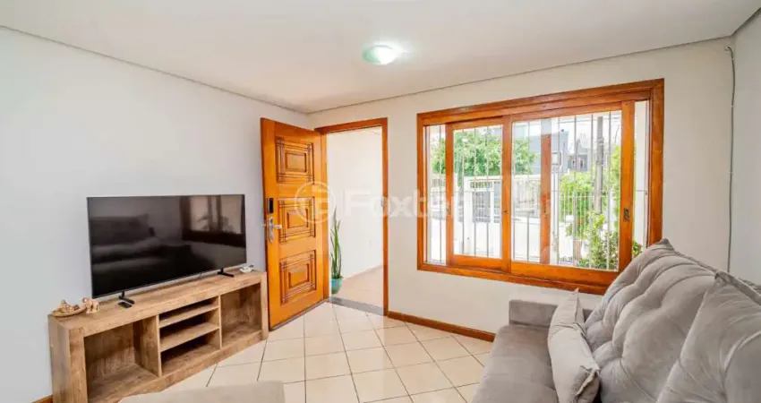 Casa com 3 quartos à venda na Rua Giobatta Giuseppe Petracco, 205, Vila Nova, Porto Alegre